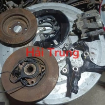 Cụm gông phanh, đĩa phanh, ngõng moay ơ Toyota Vios Tháo Xe