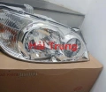0K53A51030 Đèn pha Kia Carnival 2005-2009