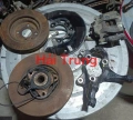 Cụm gông phanh, đĩa phanh, ngõng moay ơ Toyota Vios Tháo Xe