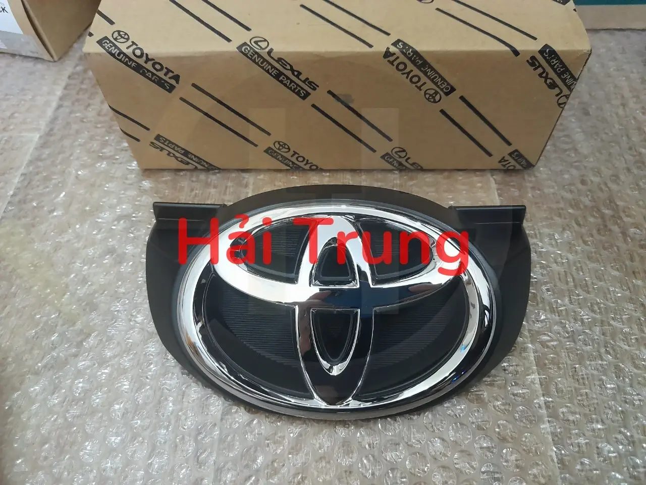 Logo ca lăng Toyota Innova 2009 chính hãng 753010K010