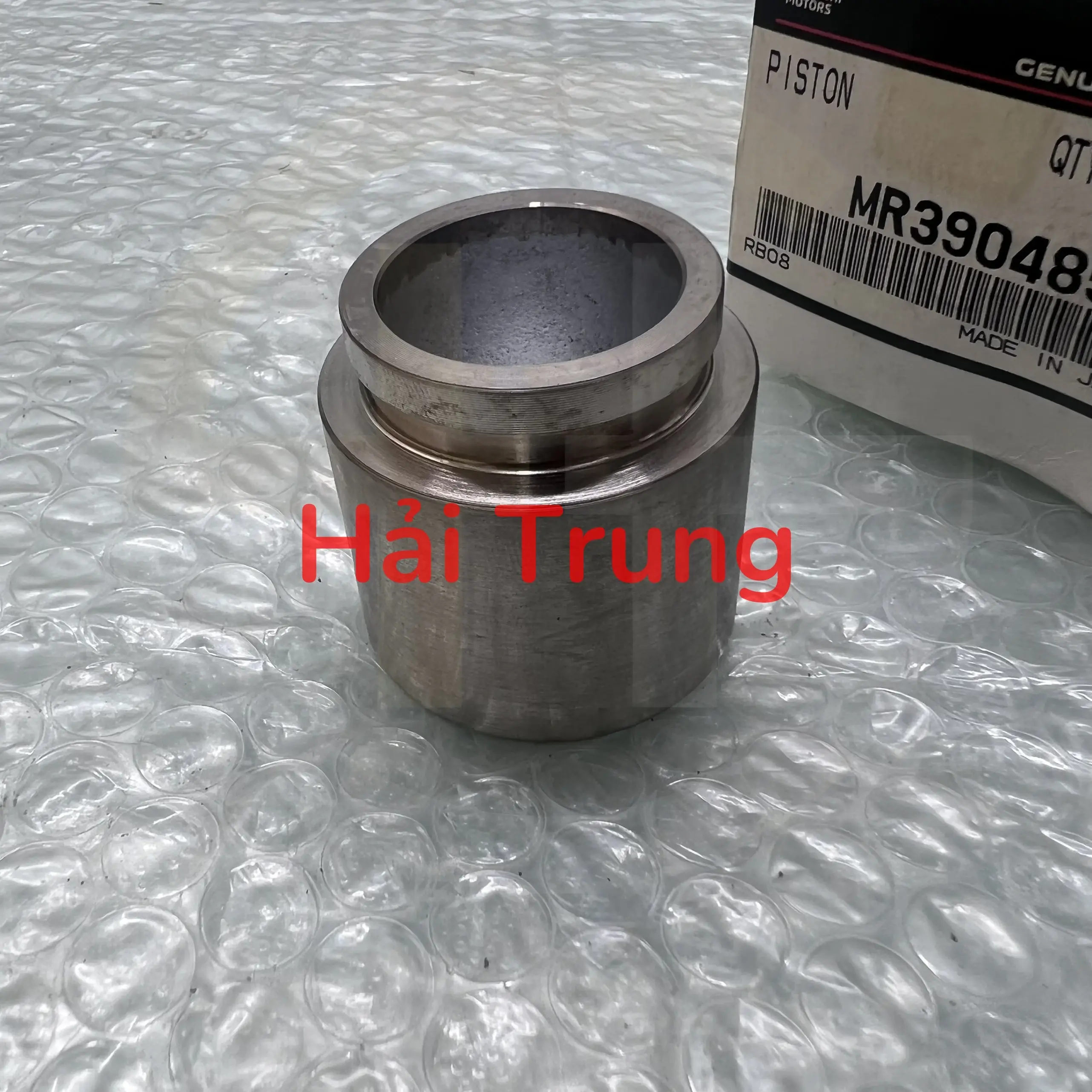 Piston phanh sau Mitsubishi Pajero 2007-2010 chính hãng MR390485