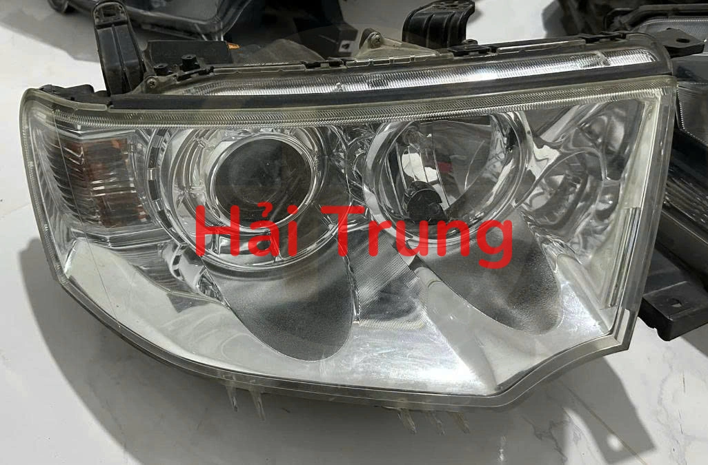 Đèn pha Mitsubishi Pajero Sport 2012-2015 Tháo Xe
