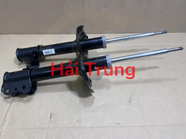 Phuộc nhún sau Mazda 323 2003 chính hãng