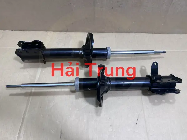 Giảm xóc sau Mazda 323 2001 chính hãng