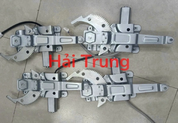Mô tơ lên xuống kính Ford Laser